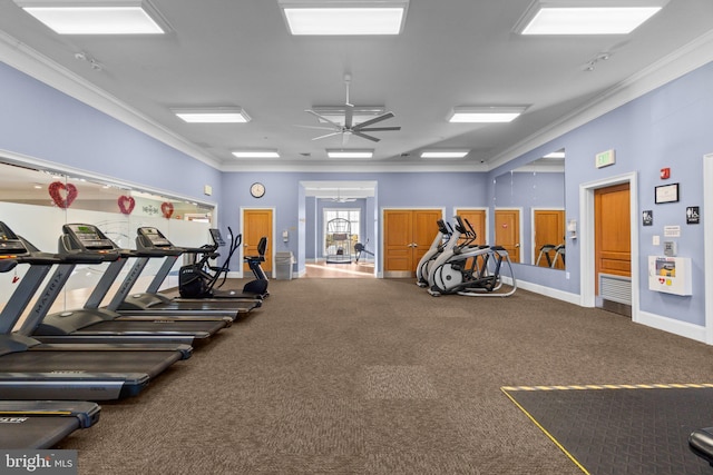 gym featuring crown molding and ceiling fan