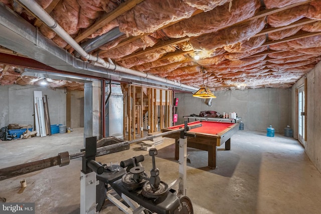 interior space featuring concrete flooring and pool table