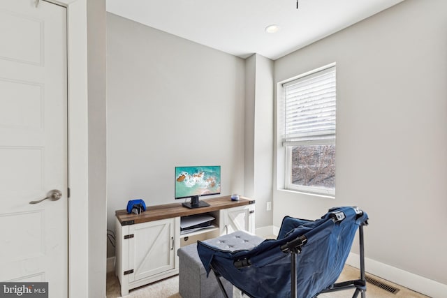 office featuring visible vents and baseboards