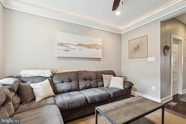 living area with crown molding, recessed lighting, ceiling fan, wood finished floors, and baseboards