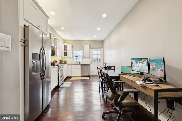 office featuring a sink, dark wood-style flooring, and recessed lighting