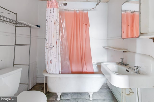 bathroom with shower / bathtub combination with curtain and toilet