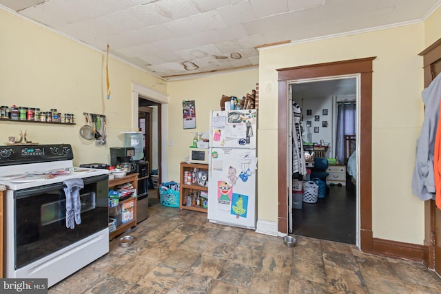 kitchen featuring electric stove, white refrigerator, and crown molding