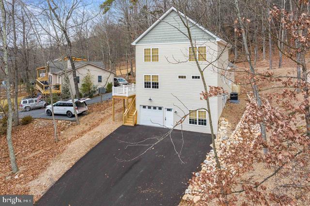 view of home's exterior with a garage