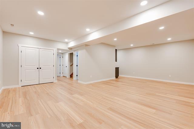 basement with light wood-type flooring