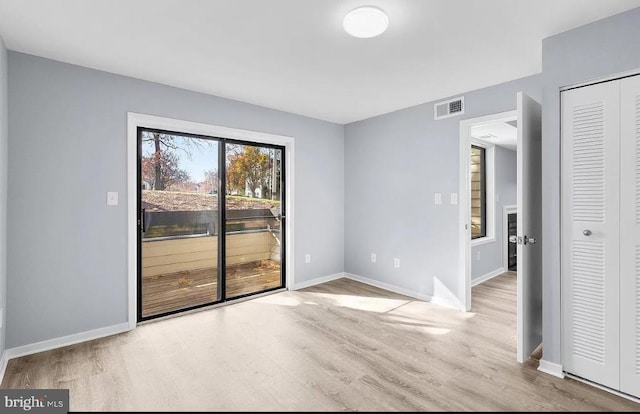 empty room featuring light hardwood / wood-style floors