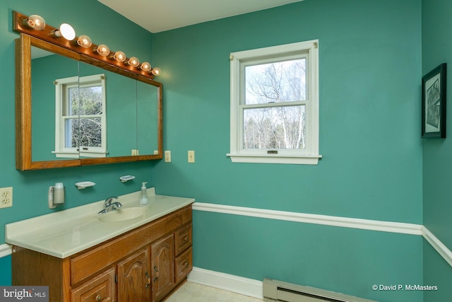 bathroom featuring vanity and a baseboard heating unit