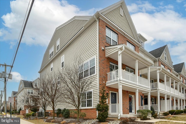 exterior space featuring a balcony and a porch