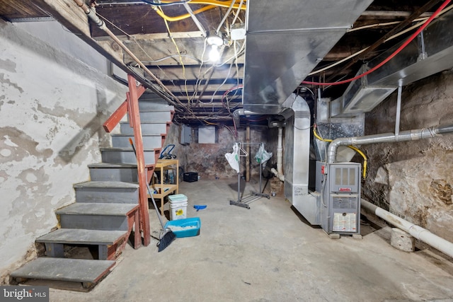 basement featuring heating unit