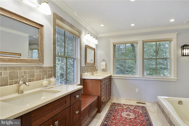 bathroom with tasteful backsplash, vanity, crown molding, and tiled tub