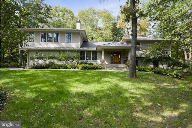 view of front of home with a front lawn