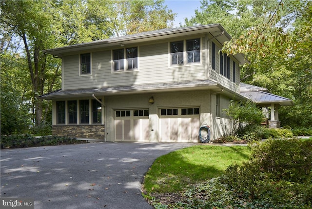 view of front of home featuring a garage