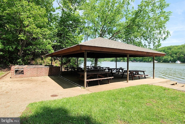 dock area featuring a gazebo and a water view