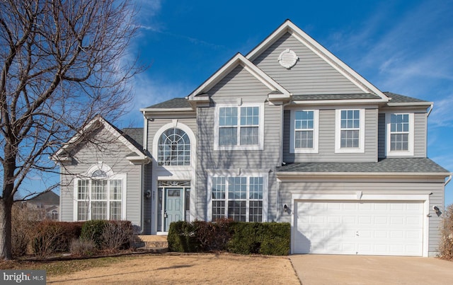 view of front property with a garage