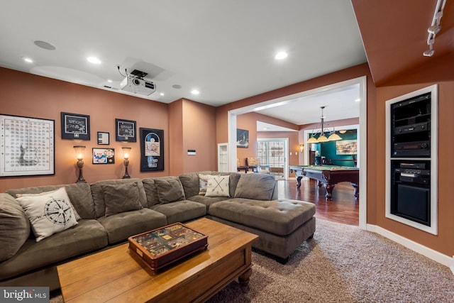 living room with carpet floors and billiards