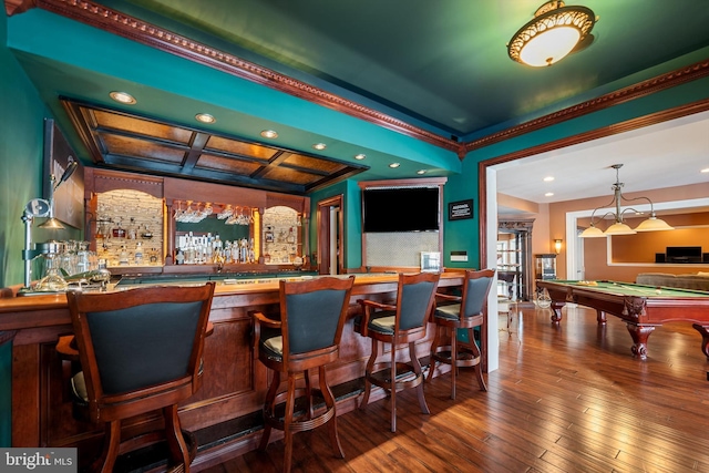 bar with crown molding, billiards, hanging light fixtures, coffered ceiling, and wood-type flooring