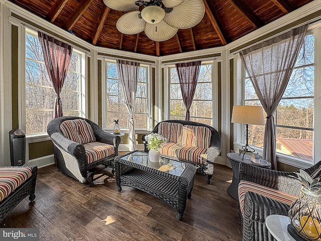 sunroom / solarium featuring wood ceiling, ceiling fan, and lofted ceiling with beams