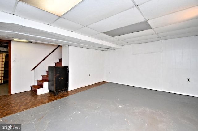 basement with a drop ceiling