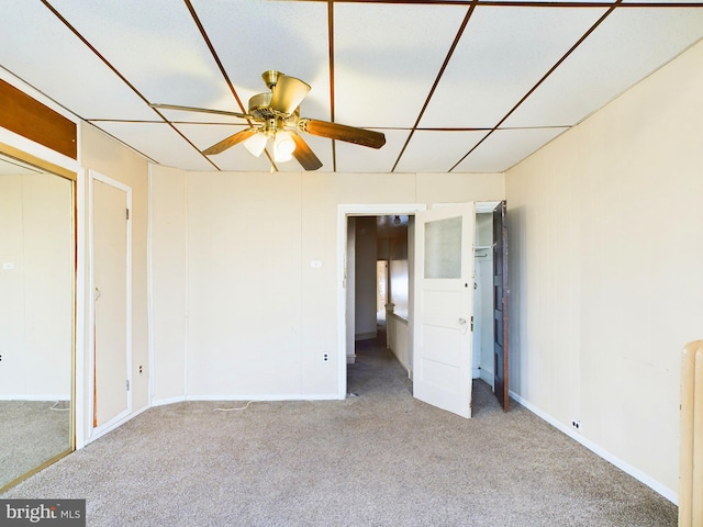 unfurnished bedroom featuring light colored carpet