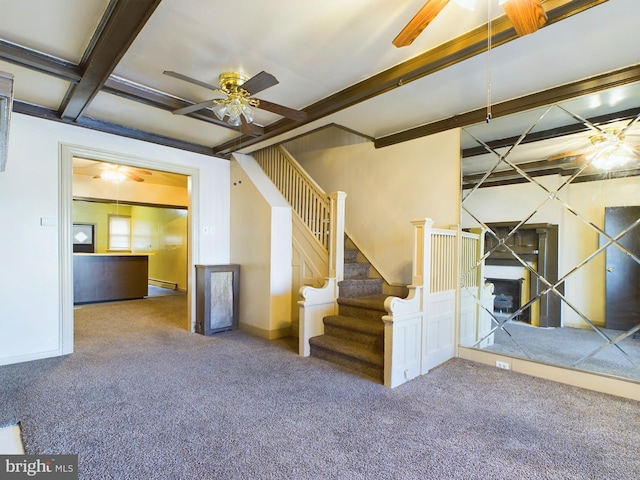 interior space with carpet flooring and ceiling fan