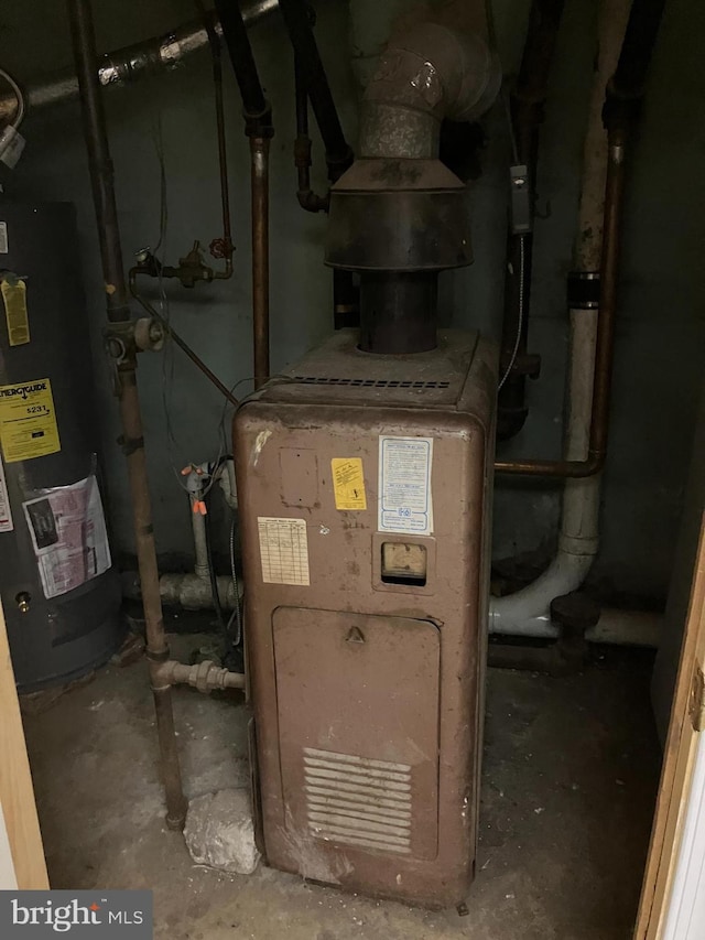 utility room with water heater