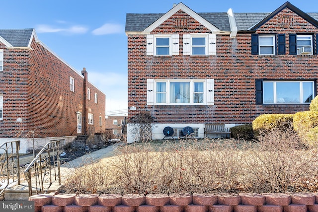 view of front facade with brick siding