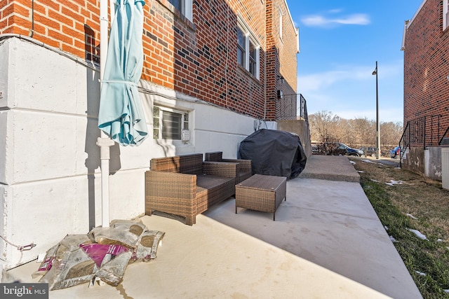 view of patio featuring outdoor lounge area and grilling area