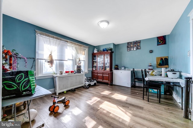 office area with hardwood / wood-style floors