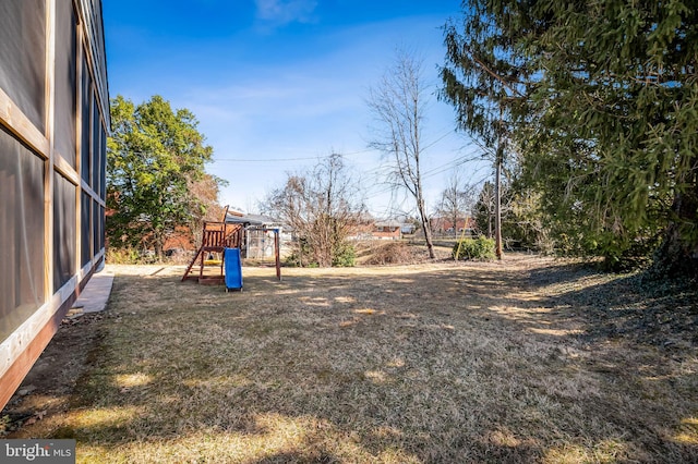 view of yard featuring a playground