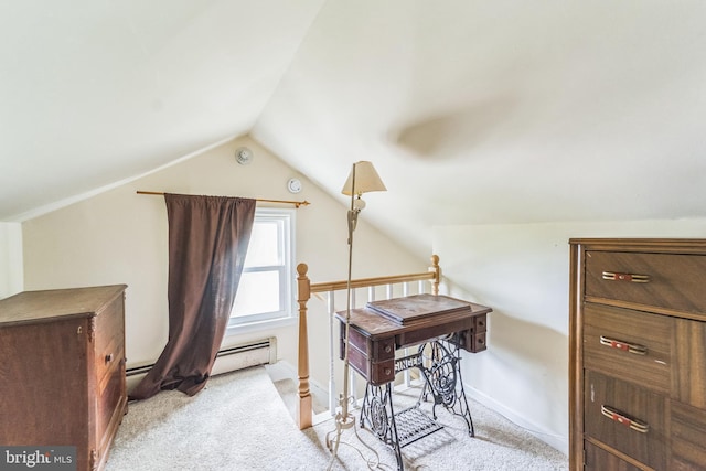 office featuring a baseboard radiator, lofted ceiling, baseboards, and light carpet