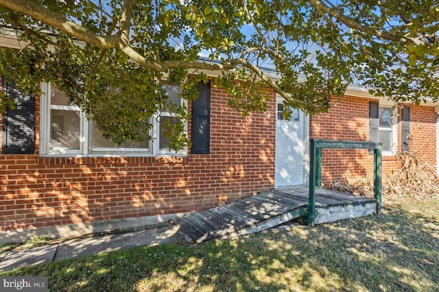 view of side of home with a deck