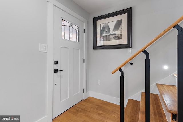 entrance foyer featuring hardwood / wood-style floors