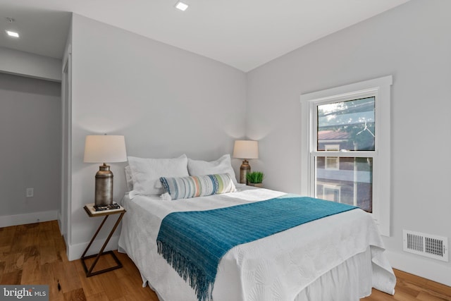 bedroom featuring hardwood / wood-style floors