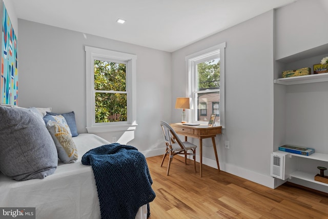 bedroom featuring light wood-type flooring