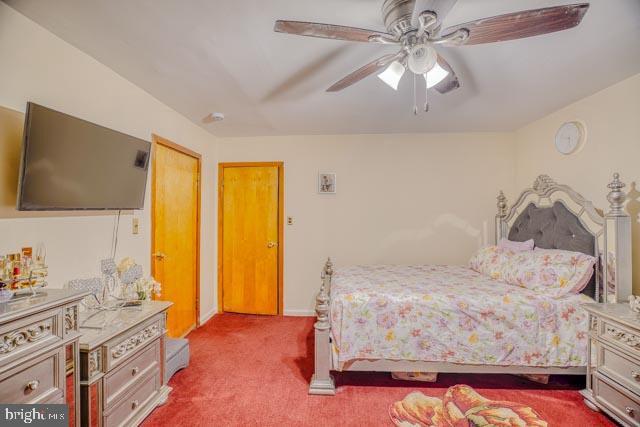 bedroom featuring carpet floors and ceiling fan