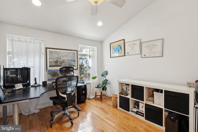 office area with ceiling fan, lofted ceiling, and wood-type flooring