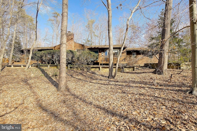 view of yard featuring a deck