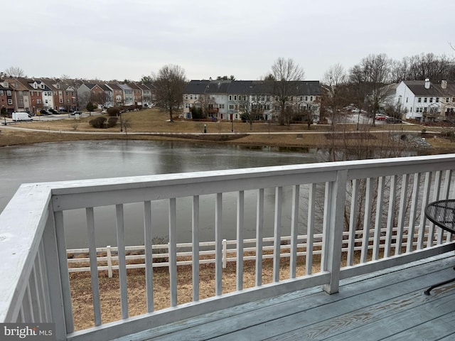 deck featuring a water view