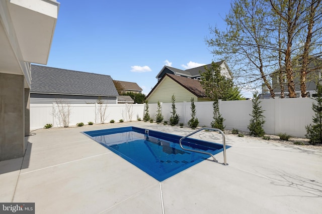 view of swimming pool with a fenced in pool, a patio, and a fenced backyard