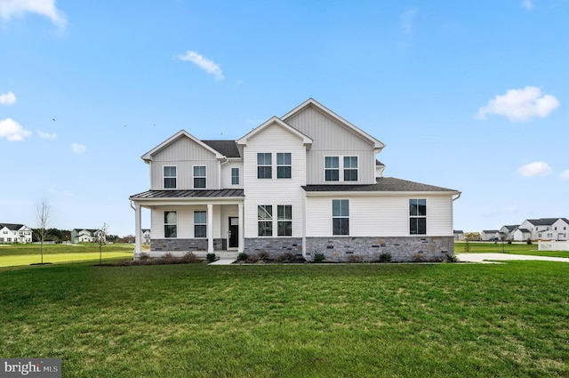 view of front of house featuring a porch and a front lawn