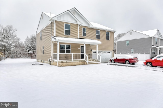 view of front of house with a porch, a garage, and board and batten siding