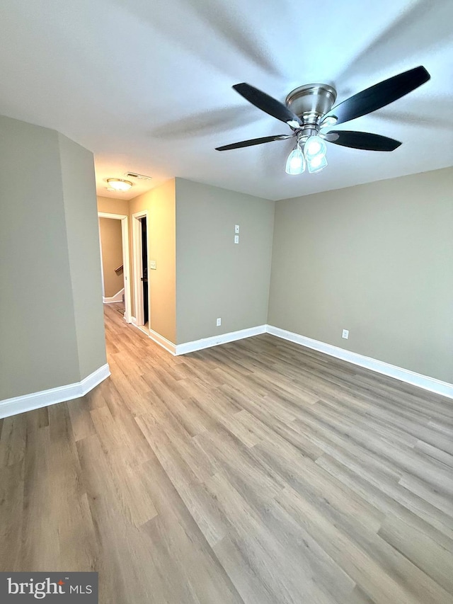 unfurnished room with light hardwood / wood-style flooring