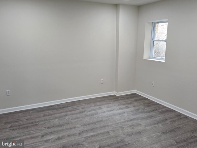 empty room featuring hardwood / wood-style floors