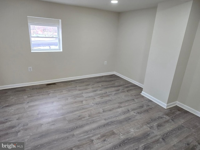 empty room featuring hardwood / wood-style floors