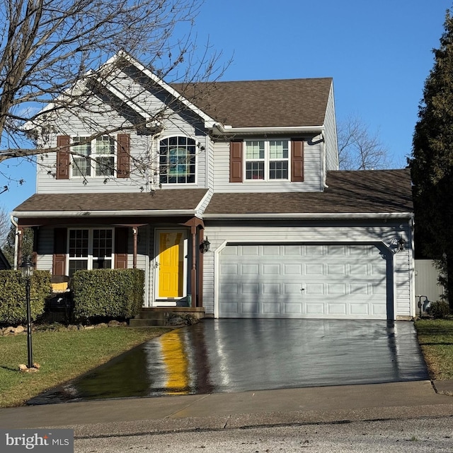 view of front of home featuring a garage