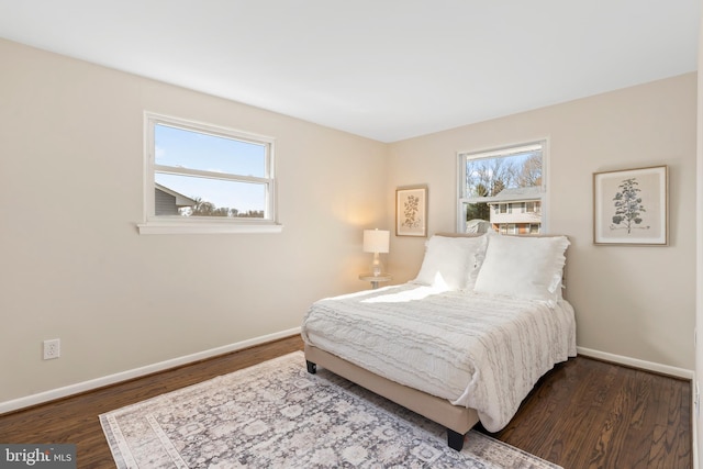 bedroom featuring dark hardwood / wood-style floors