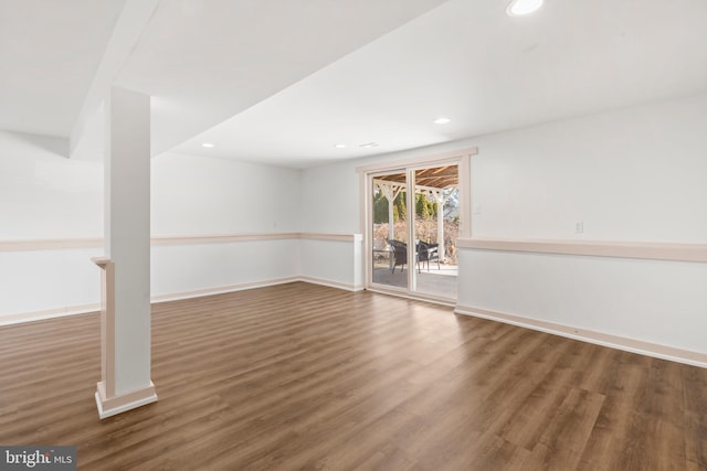 empty room featuring dark hardwood / wood-style floors