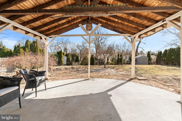 view of patio / terrace featuring a storage shed