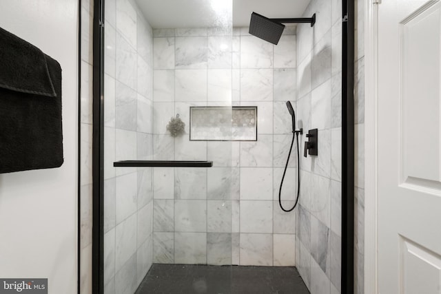 bathroom with a shower stall