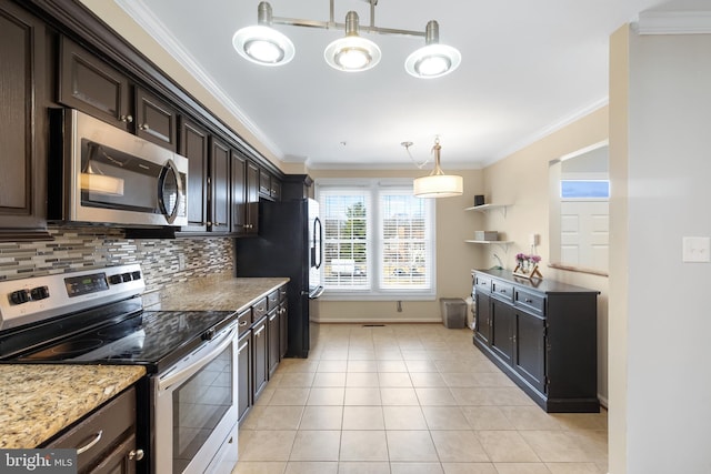 kitchen with appliances with stainless steel finishes, dark brown cabinetry, crown molding, and decorative backsplash